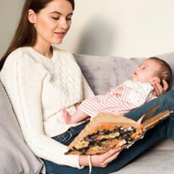 A mother at home in Dubai with her newborn after a Cesarean birth