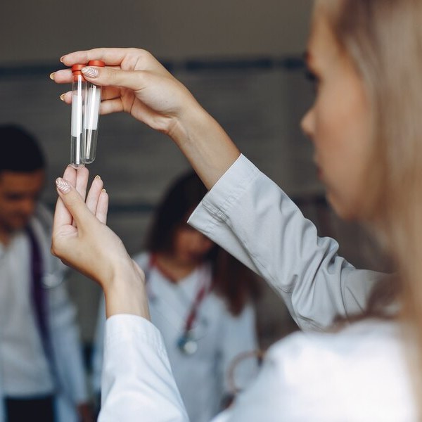 A Nightingale clinician handling STD test samples at the Dubai clinic