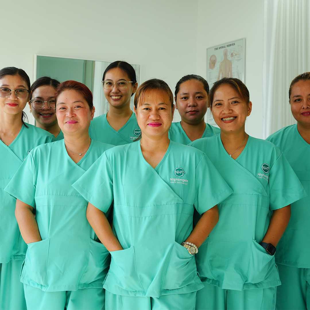 A Nightingale midwife caring for a mother and her baby at home in Dubai